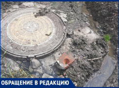Нечистоты залили улицу в Таловом, а водоканальщики разводят руками