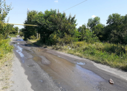 По улицам поселка Власовка разлились реки, напоминающие жителям просторы Дона